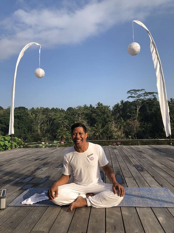 Yoga instructor Wayan Suwitra during a Laughter Yoga session at the Four Seasons Resort Bali At Sayan.
