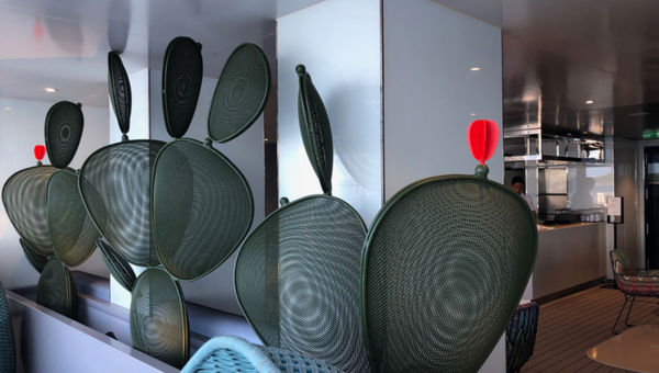 Whimsical cactus statuary decorates the pool area on Emerald Sakara. Whimsical cactus statuary decorates the pool area on Emerald Sakara.