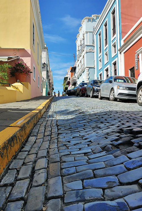 An undulating cobblestone street in Old San Juan. An undulating cobblestone street in Old San Juan.