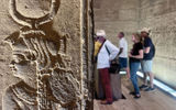 Close-up of ancient hieroglyphic carvings at the Temple of Philae while on excursion during a Viking Aton sailing on Egypt's Nile River.