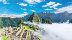Agricultural terraces and ancient houses in Machu Picchu. The daily visitor cap for Machu Picchu is expected to rise from 4,044 to 4,500 this year.