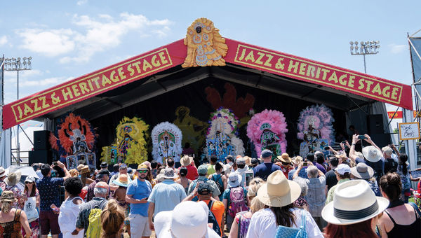 Mardi Gras Indians performing on the Louisiana Heritage Stage at the festival. Mardi Gras Indians performing on the Louisiana Heritage Stage at the festival.