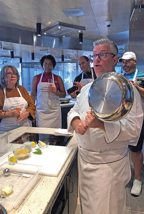 Stephano discusses the magnetic bottom of the induction cookware used in the Culinary Arts Kitchen. Stephano discusses the magnetic bottom of the induction cookware used in the Culinary Arts Kitchen.