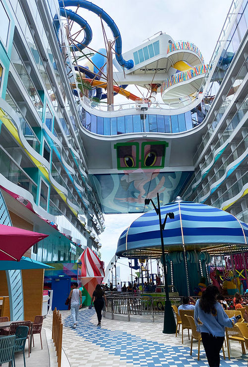 Royal Caribbean's first neighborhood for young families is at the aft of the Icon, complete with a pool, splash areas, beach-themed carousel, playscape, arcade and multiple eateries.