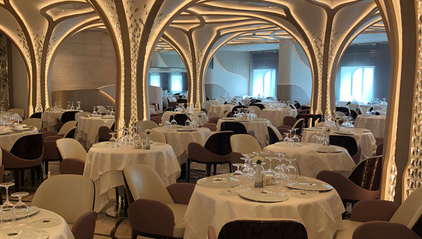 The Compass Rose restaurant on Seven Seas Grandeur has an “enchanted forest” theme.