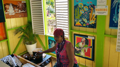 Yvette Coker, who has been with Caribelle Batik since its beginnings, creates her artwork.