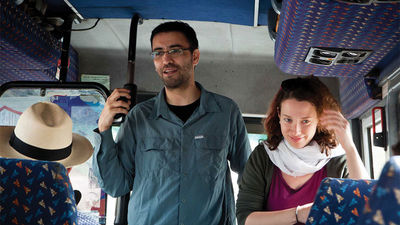 Mejdi Tours co-founder Aziz Abu Sarah addressing guests on a bus tour in Israel.