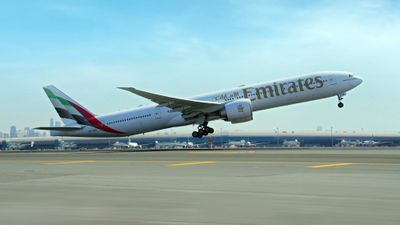 An Emirates Boeing 777-300ER taking off from Dubai.