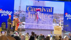 Carnival Jubilee godmother Gwen Stefani and others celebrate after a bottle of Champagne is smashed into the ship's bow.