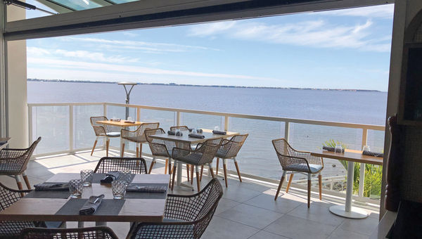 Garage door-style windows make the Blue Lime Mexican restaurant an indoor/outdoor dining venue.