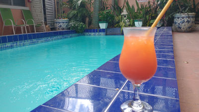 Cocktails were served poolside at the Towne Hotel in Nassau during the Bites of Nassau Food Tasting & Cultural Walking Tour.