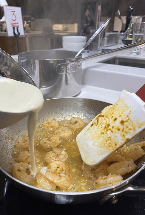 Lagasse's New New Orleans pasta called for mixing heavy cream with fettuccine and sauteed shrimp. Lagasse's New New Orleans pasta called for mixing heavy cream with fettuccine and sauteed shrimp.