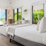 Ambergris Cay in Turks and Caicos adds beachfront bungalows