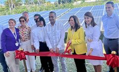 Carnival Cruise Line president Christine Duffy cuts the ribbon at a new solar park at Amber Cove in the Dominican Republic.