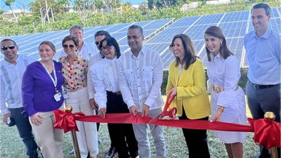 Carnival Cruise Line president Christine Duffy cuts the ribbon at a new solar park at Amber Cove in the Dominican Republic.