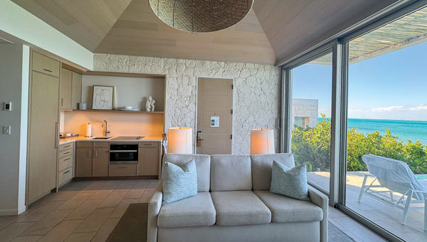 The living and kitchen area in a one-bedroom accommodation at the resort. The living and kitchen area in a one-bedroom accommodation at the resort.