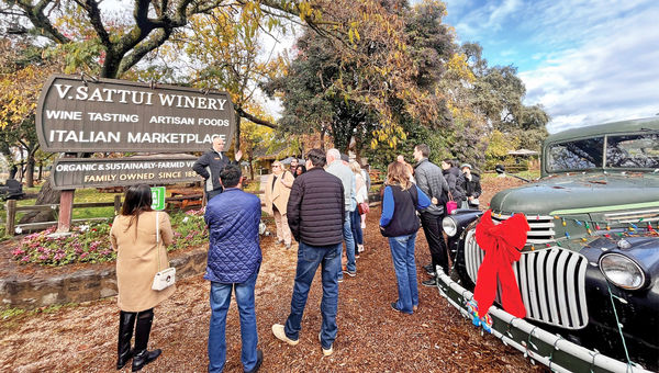 Guests at the entrance of the V. Sattui Winery in St. Helena, Calif., on the Napa Valley Wine Train's six-hour Legacy Experience.