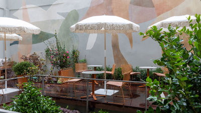 The Pilgrim Hotel has a plant-filled terrace for dining.