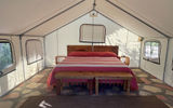 The interior of a glamping tent in the Palapas Casitas.