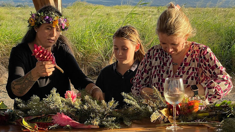 Participants learn how to make lei and floral arrangements in workshops at Maui Gold Pineapple Company.