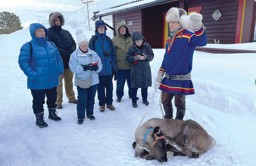 A Sami man, with his family's pet reindeer, explained the importance of the animals in Sami culture. A Sami man, with his family's pet reindeer, explained the importance of the animals in Sami culture.