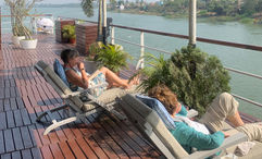 The sweeping sun deck on the Raj Mahal is lined with comfortable seating.