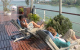The sweeping Sun Deck on the Raj Mahal is lined with comfortable seating for river views and relaxing in the sun; a bar in the center offered tea, drinks and cookies for much of the day.