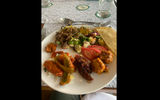 This lunch buffet featured Indian-Chinese-Indian dishes including shrimp, sweet and sour chicken and peppers, Chinese noodles, and more.