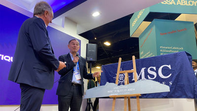 MSC Cruises executive chairman Pierfrancesco Vago (left) prepares to sign a steel outline of the MSC World Asia with Chantiers de l'Atlantique general manager Laurent Castaing.