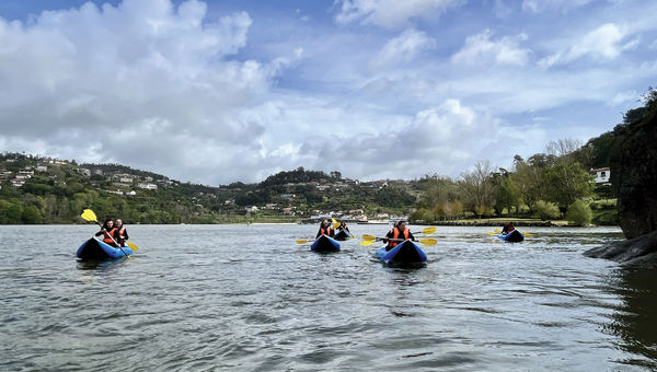 Avalon guests paddling in Portugal. The excursion's destination was to Love Island, or Ilha dos Amores, at the confluence of the Douro and Paiva rivers.
