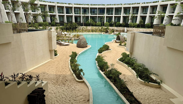 The property has nine cenote-inspired pools on the resort property, complete with plenty of sandy beach walking paths and comfortable seating areas.