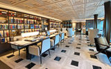 The library on the Seven Seas Grandeur was designed to resemble a modern Parisian library.