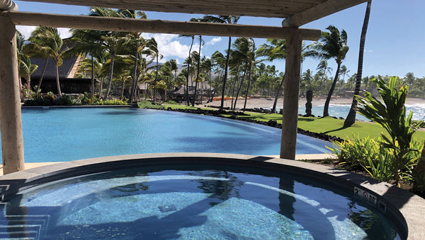 The Moana Pool area at the center of the property has a large infinity pool and two hot tubs.