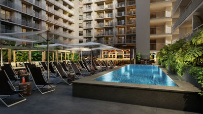 A rendering of the Backyard pool and bar on the second floor of the Romer House Waikiki.