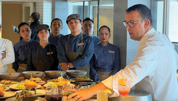 Chef Alexis Quaretti shows his staff the menu items at Aquamar Kitchen on the Marina. Chef Alexis Quaretti shows his staff the menu items at Aquamar Kitchen on the Marina.