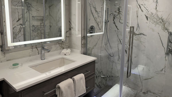 The bathroom in a refurbished Penthouse Suite. The bathroom in a refurbished Penthouse Suite.