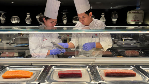 Sushi chefs behind the counter at Aji Wa, the Queen Anne's Japanese restaurant.