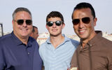Alex Sharpe, left, and Bryan Leibman, right, along with Leibman's son Daniel.