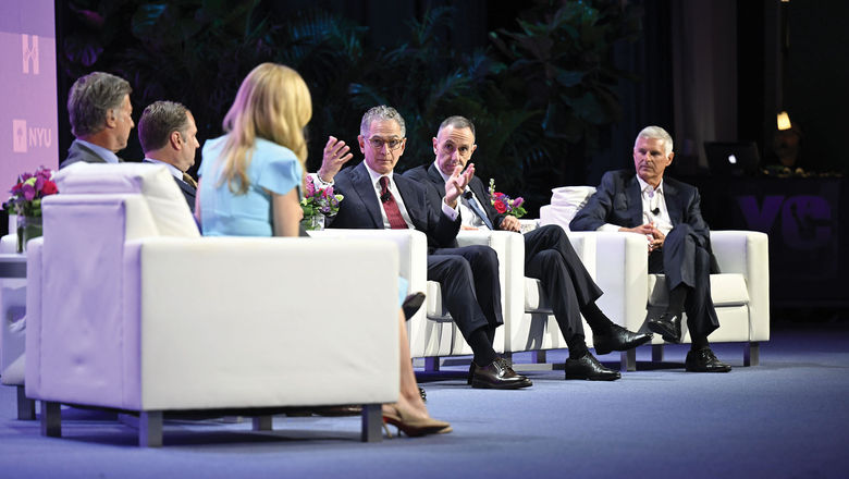 Hyatt CEO Mark Hoplamazian (center) said Hyatt's corporate accounts are up 12% for the year through April.