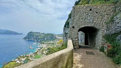 A view of the marina along the coast of Capri, as seen from the scenic vista panoramica in Anacapri. Perillo Tours' new "La Dolce Vita" itinerary includes sailing to the Isle of Capri.