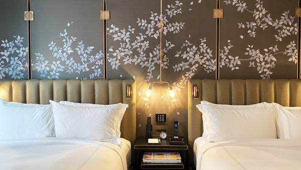 A two queen room at the hotel.