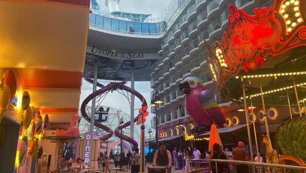 The Utopia of the Seas’ Boardwalk neighborhood with a carousel, giant parrot and the Ultimate Abyss slides. The Utopia of the Seas’ Boardwalk neighborhood with a carousel, giant parrot and the Ultimate Abyss slides.