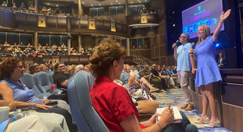 Royal Caribbean International CEO Michael Bayley and senior vice president of sales Vicki Freed address travel advisors on the new Utopia of the Seas.