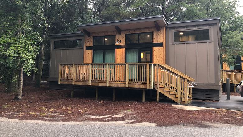 The modern cabins at Fort Wilderness Resort and Campground have clerestory windows to provide natural light. The shed-style cabins come in a handful of colors.