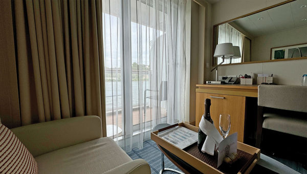 A sitting area in a deluxe veranda stateroom aboard the Viking Mississippi.