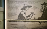 A close-up view of the excerpt from Mark Twain's " Adventures of Huckleberry Finn."