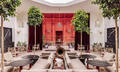The Mache restaurant has stained-glass windows, lofty ceilings and a garden terrace.