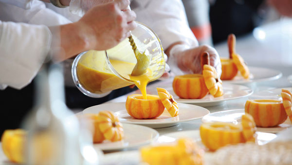Pumpkin soup served on an Atlas Ocean Voyages cruise. The Atlas Yacht Club offers perks based on the number of nights the guest has sailed. Pumpkin soup served on an Atlas Ocean Voyages cruise. The Atlas Yacht Club offers perks based on the number of nights the guest has sailed.