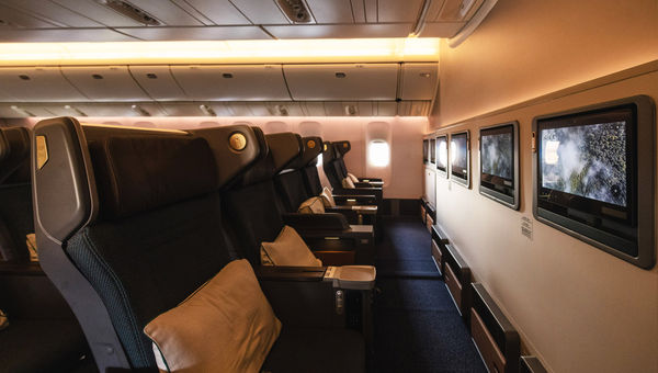 New premium economy seats feature larger seatback screens, leather headrests and footrests and wing extensions next to the headrest for privacy. New premium economy seats feature larger seatback screens, leather headrests and footrests and wing extensions next to the headrest for privacy.