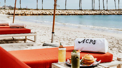 Guests of Acre Resort now have access to Veleros Beach Club.
